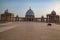 Front view of the Basilica of Our Lady of Peace with a bke rider crossing the forecourt