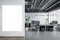 Front view on blank white poster with place for your logo on light grey wall in spacious industrial style coworking office with