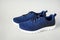 Front view of blue unisex sport shoes