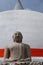 Front View of Buddha at Stupa with Red Ribbon