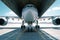 Front view of a cargo plane at the airport. Loading transport aircraft in the cargo terminal of the airport