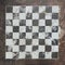 Front view of chess board made in stone. Old image