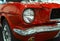 Front view of Classic retro Ford Mustang GT.Car exterior details. Headlight of a retro car.