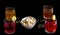 Front view of crispy snack Fox Nuts,Makhana or makhane, Lotus Seeds with Kokam Fruit drink on black background.Indian super food