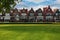 Front view of Dutch rural small new houses in countryside with g