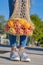 Front view on female legs, fruits and vegetables in an eco-friendly string