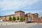 Front view with gates of Mannheim Baroque Palace on summer day