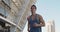 Front view of handsome sport man running outdoors. Portrait of running man jogging at stadium. Sport workout outdoor at