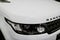 Front view headlight of a white Land Rover Range Rover Sport 2017. Car exterior details.