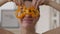 Front view headshot charming cheerful vegan woman having fun playing with bell pepper. Close-up portrait brunette