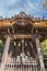Front view of Hiruko Jinja or Ebisu Jinja shinto shrine main hall. Detail of Roof Miyabori Carvings and Suzu hanging bell. Located