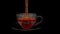 Front view of a jet of liquid filling a glass cup full of tea on glass dish on black background.