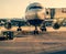 Front view of landed airplane in a terminal