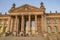 Front view from the main entrance of the parliament building of the german government in the center of Berlin. Above the pillars s