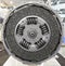 Front view of new composite clutch disc inside open housing for trucks and tractors. New friction pads. Clutch repair kit. Car mai