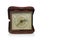 Front view old yellow and gold square alarm clock in a brown rectangular leather box on white background, gift, old, ancient,