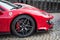 Front view of red Ferrari 488 pista parked in the street