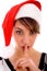 Front view of shushing woman in christmas hat