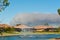 Front view of smoke and pollution from a fire moving toward a gated community