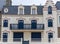 Front view of traditional granite houses along the promenade in Saint-Malo