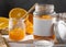 front view transparent jar with orange jam. High quality photo