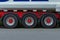 Front view on truck wheels and tires on truck chassis. Truck wheel rim