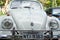 Front view of a Volkswagen, Beetle model, from 1968, silver in color seen on display in the city of Salvador, Bahia