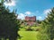 Front view of a Welsh castle and gardens