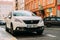 Front View Of White Peugeot 2008 Car Parked In Street. Mini Sport Utility Vehicle Produced By French Manufacturer