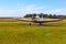 The front view of the wings, nose and propeller of Piper PA-25 Pawnee tow aircraft