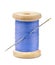 Front view of wood spool of blue thread and needle