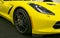 Front view of a yellow Chevrolet Corvette Z06. Car exterior details.