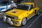 Front view of a yellow Renault 5 turbo on the street