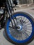 Front Wheel with Blue Rims and Fat Chrome Spokes of Vintage Styl