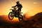 Front wheel lifted, motocross silhouette embodies adventure and daring action