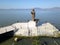 Frontal aerial view of the statue of Cristo Pescador at Lake Chapala