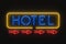 Frontal neon hotel sign