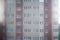 Frontal view of Architectural Exterior Detail of Residential Apartment with Brick Facade