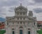 Frontal view of the facade of the Pisa Cathedral with the Leaning Tower of Pisa in the back, in Pisa, Italy