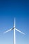 Frontal view of a Windmill taken from below with blue sky in the background