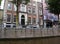 Fronts of Dutch houses - Boats tour through the canals in the Grachtengordel-West area of Amsterdam, Holland, Netherlands