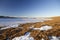 Frost and light snow on a frozen Riblje Lake at sunset, National Park Durmitor, Montenegro