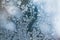 Frost over window glass, close-up abstract