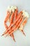 frosted Alaska king crab legs closeup photo on white table background