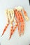 frosted Alaska king crab legs closeup photo on white table background