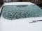 Frosted Snow on the Car Windshield in February