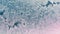 Frosting on a window glass in winter. Weather forecast. Blue and pink tinted wallpaper. Abstract season background. Christmas