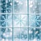 Frostwork. Close up of snowflakes on the window glass. Winter background.