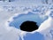 Frosty Abyss: Unveiling the Beauty of the Hole in the Snow