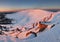 Frosty sunset panorama in beauty winter mountains